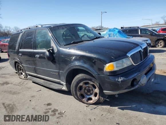 ✅ 2001 Lincoln Navigator • VIN: 5LMFU28R41LJ22107 • Lot: 47559335. Listed on Copart with 251,896 mi. Free auction sales archive from the USA and detailed vehicle history report at DreamBid. Image 4.