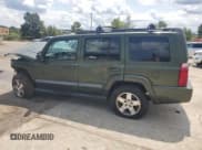 ✅ 2009 Jeep Commander Sport • VIN: 1J8HG48K59C511283 • Lot: 69678195. Listed on Copart with 236,781 mi. Free auction sales archive from the USA and detailed vehicle history report at DreamBid. Image 2.
