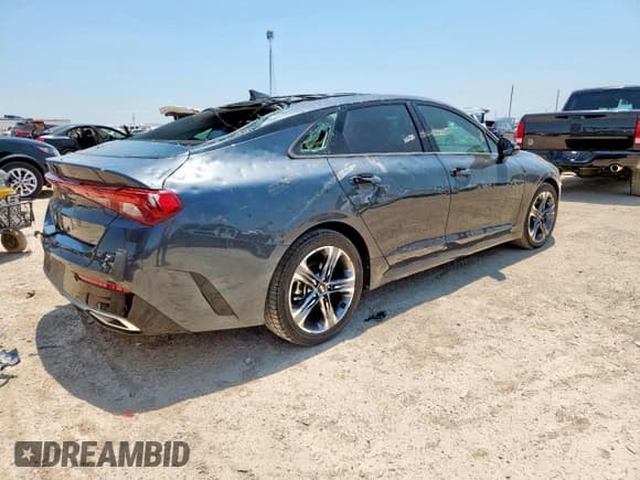 ✅ 2021 Kia K5 EX • VIN: 5XXG34J26MG008590 • Лот: 84569625. Опубликован ранее на Copart с пробегом 84 551 миль. Бесплатный доступ к архиву аукционных продаж из США и подробный отчёт об истории автомобиля на DreamBid. Изображение 3.