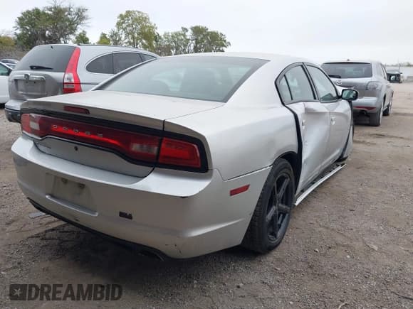 ✅ 2012 Dodge Charger Police • VIN: 2C3CDXAT1CH305496 • Lot: 43428332. Listed on IAAI with 249,533 mi. Free auction sales archive from the USA and detailed vehicle history report at DreamBid. Image 4.