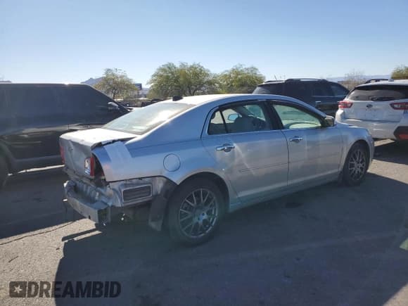 ✅ 2012 Chevrolet Malibu 2LT • VIN: 1G1ZD5E03CF309831 • Lot: 79870324. Listed on Copart with 114,520 mi. Free auction sales archive from the USA and detailed vehicle history report at DreamBid. Image 3.