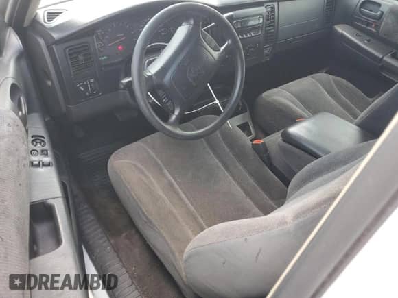 2002 Dodge Dakota SLT с VIN 1B7GL42N72S593692, выставлен на аукционе Copart как лот 69221245 с пробегом 141 599 миль миль и Списание • Salvage title. История ставок и продаж доступна на DreamBid. Изображение 8.