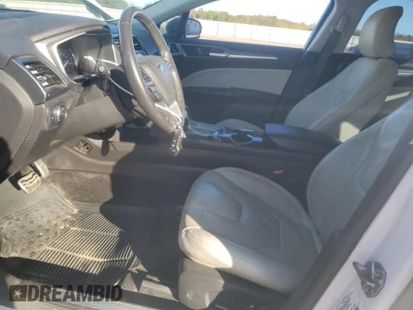 ✅ 2015 Ford Fusion Titanium Hybrid • VIN: 3FA6P0RUXFR220448 • Lot: 82611635. Listed on Copart with 151,094 mi. Free auction sales archive from the USA and detailed vehicle history report at DreamBid. Image 7.