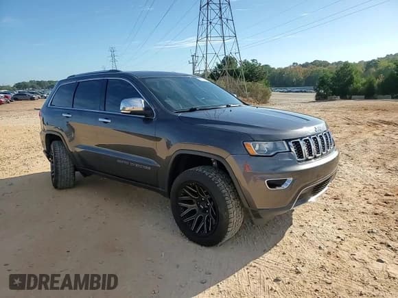 ✅ 2017 Jeep Grand Cherokee Limited • VIN: 1C4RJFBG0HC867216 • Lot: 82219425. Listed on Copart with 145,884 mi. Free auction sales archive from the USA and detailed vehicle history report at DreamBid. Image 14.