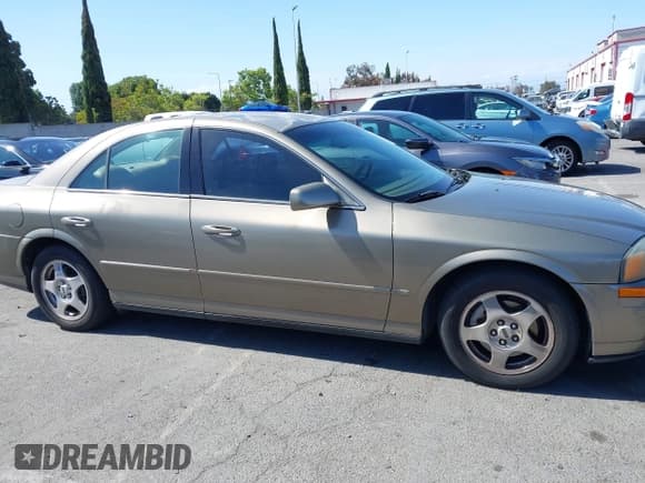 ✅ 2001 Lincoln LS Sport • VIN: 1LNHM86S31Y714332 • Лот: 42238079. Опубликован ранее на IAAI с пробегом 74 152 миль. Бесплатный доступ к архиву аукционных продаж из США и подробный отчёт об истории автомобиля на DreamBid. Изображение 13.