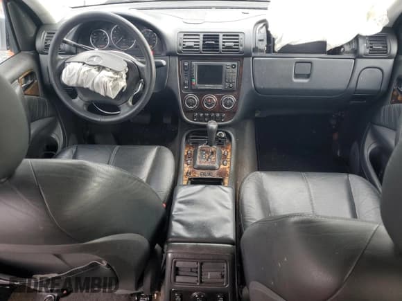 ✅ 2005 Mercedes-Benz M 500 • VIN: 4JGAB75E35A532559 • Lot: 85321484. Listed on Copart with 305,999 mi. Free auction sales archive from the USA and detailed vehicle history report at DreamBid. Image 8.