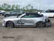 2021 Ford Mustang EcoBoost z VIN 1FATP8UH3M5104956, wystawiony jako IAAI lot #43363896 z przebiegiem 122 055 mil mil oraz . Historia ofert i sprzedaży dostępna na DreamBid. Obrazek 14.