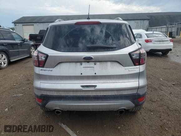 ✅ 2017 Ford Escape Titanium • VIN: 1FMCU0J91HUE45264 • Лот: 66485925. Опубликован ранее на Copart с пробегом 64 288 миль. Бесплатный доступ к архиву аукционных продаж из США и подробный отчёт об истории автомобиля на DreamBid. Изображение 6.