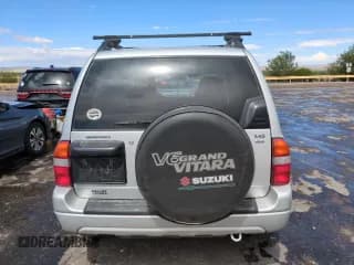 ✅ 2003 Suzuki Grand Vitara • VIN: JS3TD62V434104082 • Лот: 57349105. Опубликован ранее на Copart с пробегом Не указан. Бесплатный доступ к архиву аукционных продаж из США и подробный отчёт об истории автомобиля на DreamBid. Изображение 6.