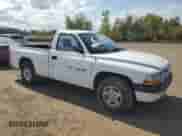 2001 Dodge Dakota z VIN 1B7FL26X91S132570, wystawiony jako Copart lot #72270094 z przebiegiem 118 842 mil mil oraz Szkoda całkowita • Salvage title. Historia ofert i sprzedaży dostępna na DreamBid. Obrazek 4.