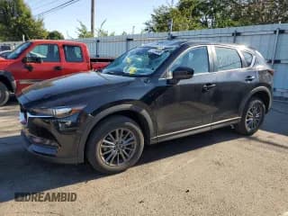 ✅ 2021 Mazda CX-5 Sport • VIN: JM3KFBBM7M0351990 • Lot: 71209495. Listed on Copart with 43,108 mi. Free auction sales archive from the USA and detailed vehicle history report at DreamBid. Image 1.
