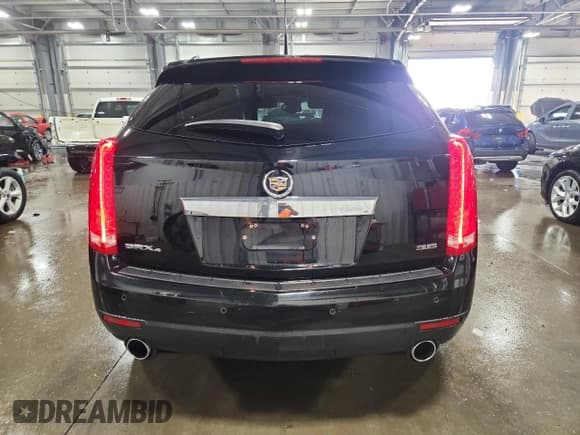 ✅ 2012 Cadillac SRX Performance Collection • VIN: 3GYFNEE31CS543098 • Лот: 84956275. Опубликован ранее на Copart с пробегом 136 426 миль. Бесплатный доступ к архиву аукционных продаж из США и подробный отчёт об истории автомобиля на DreamBid. Изображение 6.