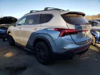 2022 Hyundai Santa Fe XRT z VIN 5NMS6DAJ0NH414005, wystawiony jako Copart lot #66886692 z przebiegiem 4 585 mil mil oraz . Historia ofert i sprzedaży dostępna na DreamBid. Obrazek 3.