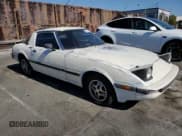 ✅ 1985 Mazda RX-7 • VIN: JM1FB3310F0860015 • Lot: 80110214. Wystawiony na Copart z przebiegiem 145 208 mil. Bezpłatny archiwum sprzedaży aukcyjnych z USA i szczegółowy raport historii pojazdu na DreamBid. Zdjęcie 4.