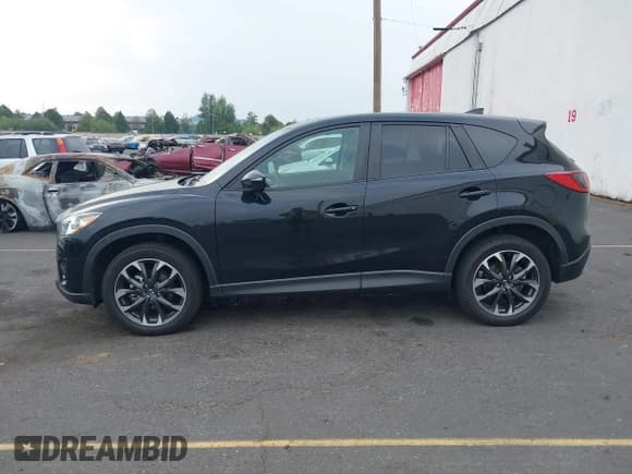 ✅ 2016 Mazda CX-5 Grand Touring • VIN: JM3KE4DYXG0834635 • Лот: 43131064. Опубликован ранее на IAAI с пробегом 161 126 миль. Бесплатный доступ к архиву аукционных продаж из США и подробный отчёт об истории автомобиля на DreamBid. Изображение 14.