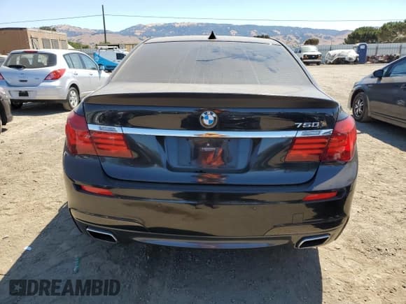 ✅ 2013 BMW 7 Series 750i • VIN: WBAYA8C59DD227527 • Lot: 64618025. Listed on Copart with 96,049 mi. Free auction sales archive from the USA and detailed vehicle history report at DreamBid. Image 6.