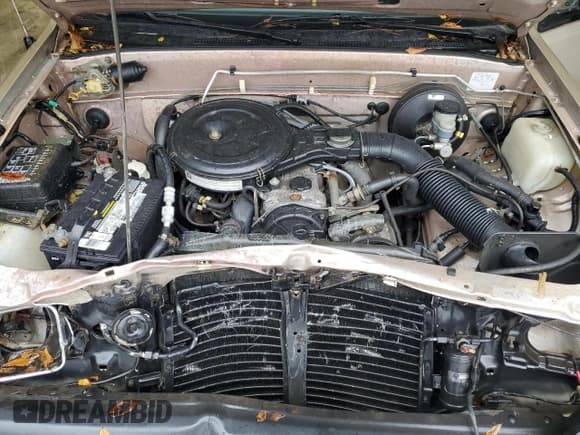 ✅ 1992 Isuzu Pickup S • VIN: 4S1CL11L0N4208813 • Лот: 80966344. Опубликован ранее на Copart с пробегом 166 056 миль. Бесплатный доступ к архиву аукционных продаж из США и подробный отчёт об истории автомобиля на DreamBid. Изображение 12.