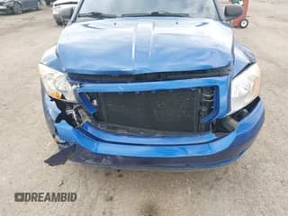 ✅ 2010 Dodge Caliber Mainstreet • VIN: 1B3CB3HA8AD567123 • Lot: 43532419. Listed on IAAI with 119,802 mi. Free auction sales archive from the USA and detailed vehicle history report at DreamBid. Image 6.