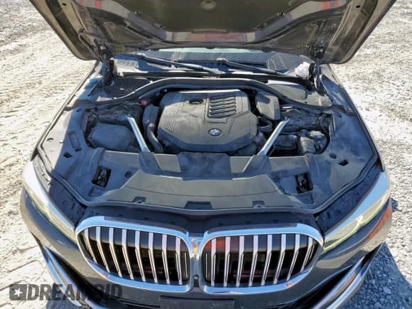 ✅ 2020 BMW 7 Series 740i • VIN: WBA7T2C00LCE43524 • Лот: 90944855. Опубликован ранее на Copart с пробегом 99 849 миль. Бесплатный доступ к архиву аукционных продаж из США и подробный отчёт об истории автомобиля на DreamBid. Изображение 11.