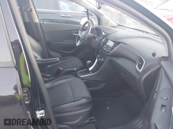 ✅ 2022 Chevrolet Trax LT • VIN: KL7CJPSM4NB503316 • Lot: 43513215. Listed on IAAI with 56,307 mi. Free auction sales archive from the USA and detailed vehicle history report at DreamBid. Image 5.