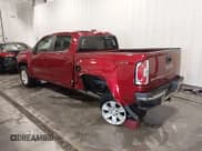 ✅ 2018 GMC Canyon 4WD SLE • VIN: 1GTG6CEN1J1174643 • Лот: 43660608. Опубликован ранее на IAAI с пробегом 83 972 миль. Бесплатный доступ к архиву аукционных продаж из США и подробный отчёт об истории автомобиля на DreamBid. Изображение 3.