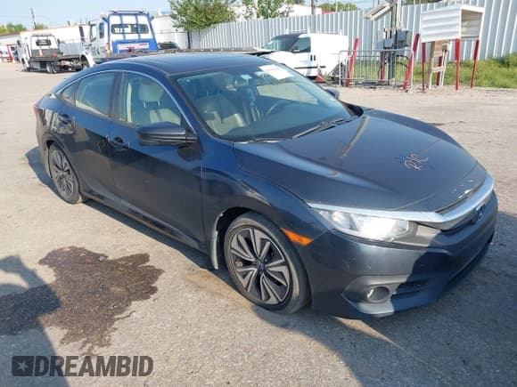 ✅ 2018 Honda Civic EX-L • VIN: JHMFC1F7XJX040301 • Lot: 43151124. Listed on IAAI with 135,190 mi. Free auction sales archive from the USA and detailed vehicle history report at DreamBid. Image 1.