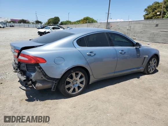 ✅ 2013 Jaguar XF RWD • VIN: SAJWA0E77D8S91277 • Lot: 63109595. Listed on Copart with 81,735 mi. Free auction sales archive from the USA and detailed vehicle history report at DreamBid. Image 3.