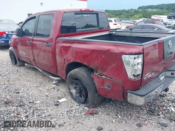 ✅ 2009 Nissan Titan SE • VIN: 1N6BA07D59N313413 • Lot: 42793004. Wystawiony na IAAI z przebiegiem 153 195 mil. Bezpłatny archiwum sprzedaży aukcyjnych z USA i szczegółowy raport historii pojazdu na DreamBid. Zdjęcie 3.