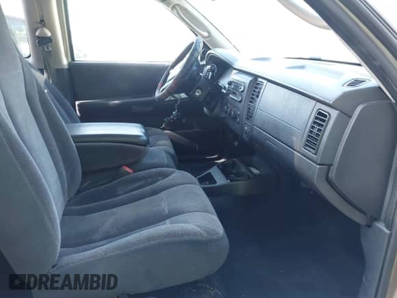 2002 Dodge Dakota SLT with VIN 1B7GG42N12S515140, listed as a IAAI auction lot 42309633 with 215,774 mi miles and . Bid and sale history available at DreamBid. Image 5.