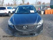 ✅ 2016 Mazda CX-5 Sport • VIN: JM3KE4BY9G0784667 • Lot: 43737851. Listed on IAAI with 151,569 mi. Free auction sales archive from the USA and detailed vehicle history report at DreamBid. Image 12.