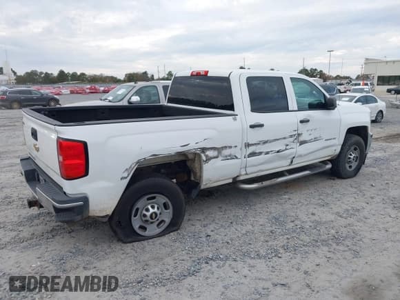 ✅ 2016 Chevrolet Silverado 2500HD Work Truck • VIN: 1GC1CUEG6GF135824 • Lot: 41037016. Listed on IAAI with 239,295 mi. Free auction sales archive from the USA and detailed vehicle history report at DreamBid. Image 4.