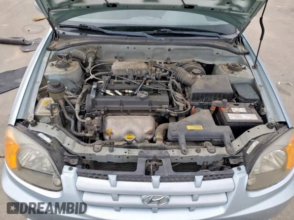 2003 Hyundai Accent GL z VIN KMHCG45C73U481294, wystawiony jako Copart lot #55958005 z przebiegiem 136 964 mil mil oraz Czysty tytuł • Clean title. Historia ofert i sprzedaży dostępna na DreamBid. Obrazek 11.