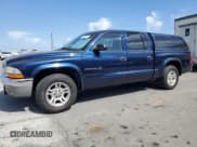 ✅ 2001 Dodge Dakota Sport • VIN: 1B7HL2AX31S278317 • Lot: 55467745. Listed on Copart with 86,799 mi. Free auction sales archive from the USA and detailed vehicle history report at DreamBid. Image 1.