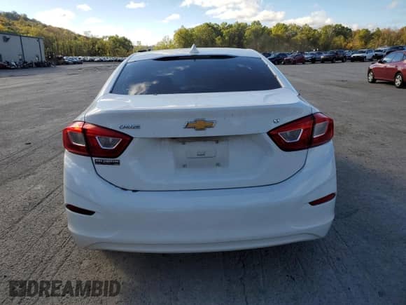 2017 Chevrolet Cruze LT z VIN 1G1BE5SM0H7276763, wystawiony jako Copart lot #82418775 z przebiegiem 99 335 mil mil oraz Szkoda całkowita • Salvage title. Historia ofert i sprzedaży dostępna na DreamBid. Obrazek 6.