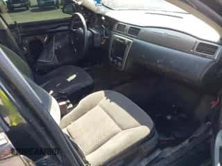 2013 Chevrolet Impala Police with VIN 2G1WD5E35D1106638, listed as a IAAI auction lot 42791624 with 198,805 mi miles and . Bid and sale history available at DreamBid. Image 5.