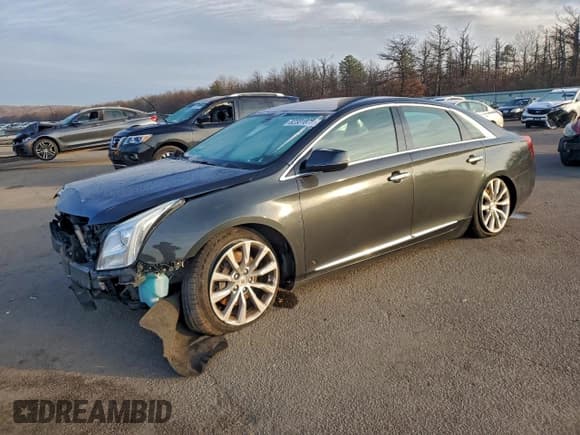 ✅ 2015 Cadillac XTS Luxury • VIN: 2G61M5S39F9203791 • Lot: 82331875. Wystawiony na Copart z przebiegiem 135 011 mil. Bezpłatny archiwum sprzedaży aukcyjnych z USA i szczegółowy raport historii pojazdu na DreamBid. Zdjęcie 1.