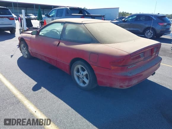 ✅ 1993 Ford Probe • VIN: 1ZVCT22B2P5131827 • Lot: 43710009. Listed on IAAI with 127,812 mi. Free auction sales archive from the USA and detailed vehicle history report at DreamBid. Image 3.