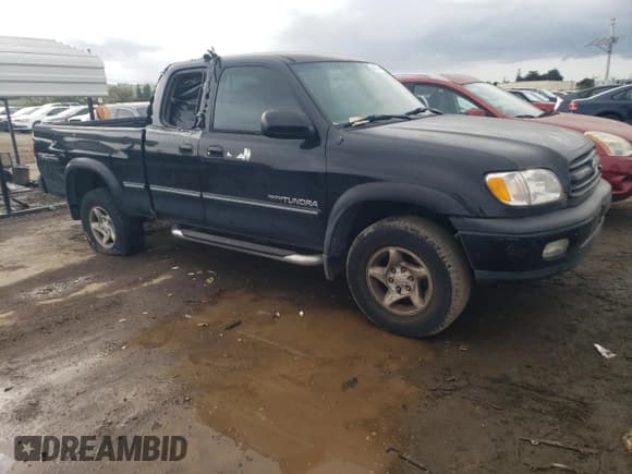 ✅ 2002 Toyota Tundra Limited • VIN: 5TBRT38132S233392 • Lot: 49057454. Listed on Copart with 248,313 mi. Free auction sales archive from the USA and detailed vehicle history report at DreamBid. Image 4.