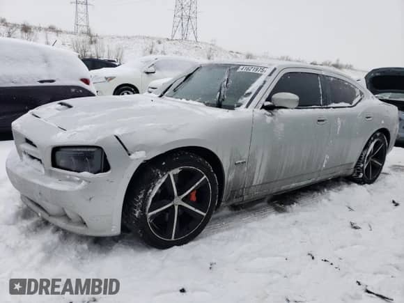 2008 Dodge Charger SRT-8 с VIN 2B3LA73W68H198045, выставлен на аукционе Copart как лот 41621975 с пробегом 215 475 миль миль и Списание • Salvage title. История ставок и продаж доступна на DreamBid. Изображение 1.