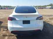 ✅ 2023 Tesla Model Y Long Range • VIN: 7SAYGDEE4PA070722 • Lot: 43324153. Listed on IAAI with Not provided. Free auction sales archive from the USA and detailed vehicle history report at DreamBid. Image 17.