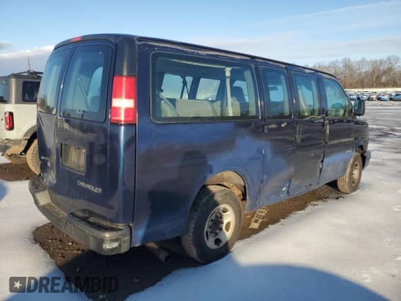 2005 Chevrolet Express Passenger с VIN 1GAGG25V151202897, выставлен на аукционе Copart как лот 43772225 с пробегом 147 778 миль миль и Списание • Salvage title. История ставок и продаж доступна на DreamBid. Изображение 3.