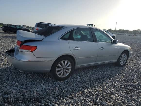 2006 Hyundai Azera SE с VIN KMHFC46F96A037972, выставлен на аукционе Copart как лот 61035765 с пробегом 140 857 миль миль и Списание • Salvage title. История ставок и продаж доступна на DreamBid. Изображение 3.