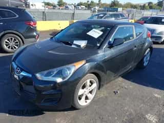 2012 Hyundai Veloster w/Red Int with VIN KMHTC6AD2CU029761, listed as a IAAI auction lot 43603146 with 64,357 mi miles and . Bid and sale history available at DreamBid. Image 6.