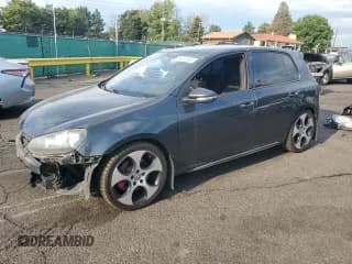 ✅ 2011 Volkswagen Golf GTI • VIN: WVWGV7AJ4BW125485 • Lot: 64241535. Listed on Copart with 101,261 mi. Free auction sales archive from the USA and detailed vehicle history report at DreamBid. Image 1.