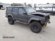 ✅ 1994 Jeep Cherokee Sport • VIN: 1J4FT68S0RL177339 • Lot: 47237805. Listed on Copart with 207,156 mi. Free auction sales archive from the USA and detailed vehicle history report at DreamBid. Image 4.