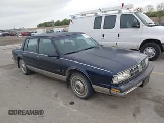 ✅ 1989 Oldsmobile 98 • VIN: 1G3CW54C2K1333343 • Лот: 42196870. Опубликован ранее на IAAI с пробегом 120 916 миль. Бесплатный доступ к архиву аукционных продаж из США и подробный отчёт об истории автомобиля на DreamBid. Изображение 1.