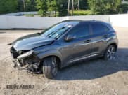 ✅ 2020 Hyundai Kona Ultimate • VIN: KM8K5CA57LU446029 • Лот: 64626253. Опубликован ранее на Copart с пробегом Не указан. Бесплатный доступ к архиву аукционных продаж из США и подробный отчёт об истории автомобиля на DreamBid. Изображение 1.