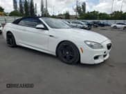 ✅ 2013 BMW 6 Series 650i • VIN: WBAYP9C53DDW21402 • Lot: 61458055. Listed on Copart with 90,694 mi. Free auction sales archive from the USA and detailed vehicle history report at DreamBid. Image 4.