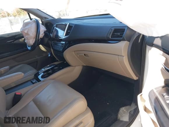 ✅ 2018 Honda Pilot Touring • VIN: 5FNYF6H94JB064262 • Lot: 43592058. Listed on IAAI with 77,731 mi. Free auction sales archive from the USA and detailed vehicle history report at DreamBid. Image 5.