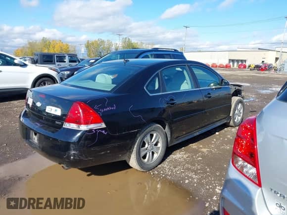 2015 Chevrolet Impala LS with VIN 2G1WA5E38F1144277, listed as a IAAI auction lot 43500644 with 129,373 mi miles and . Bid and sale history available at DreamBid. Image 4.